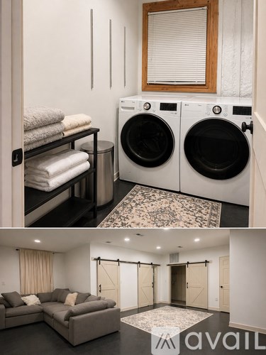 A laundry room with a washer and dryer, a shelf with towels, and a living room with a couch and a rug.