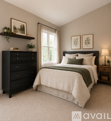 A bedroom with a large bed, a dresser, and a nightstand.