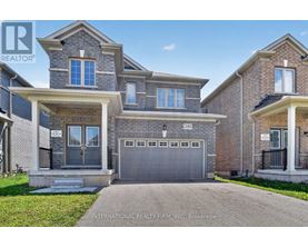 A large house with a garage is for sale.