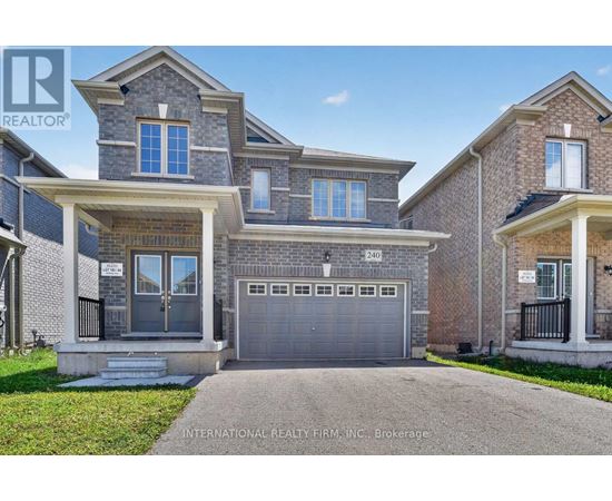 A large house with a garage is for sale.