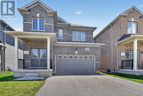 A large house with a garage is for sale.