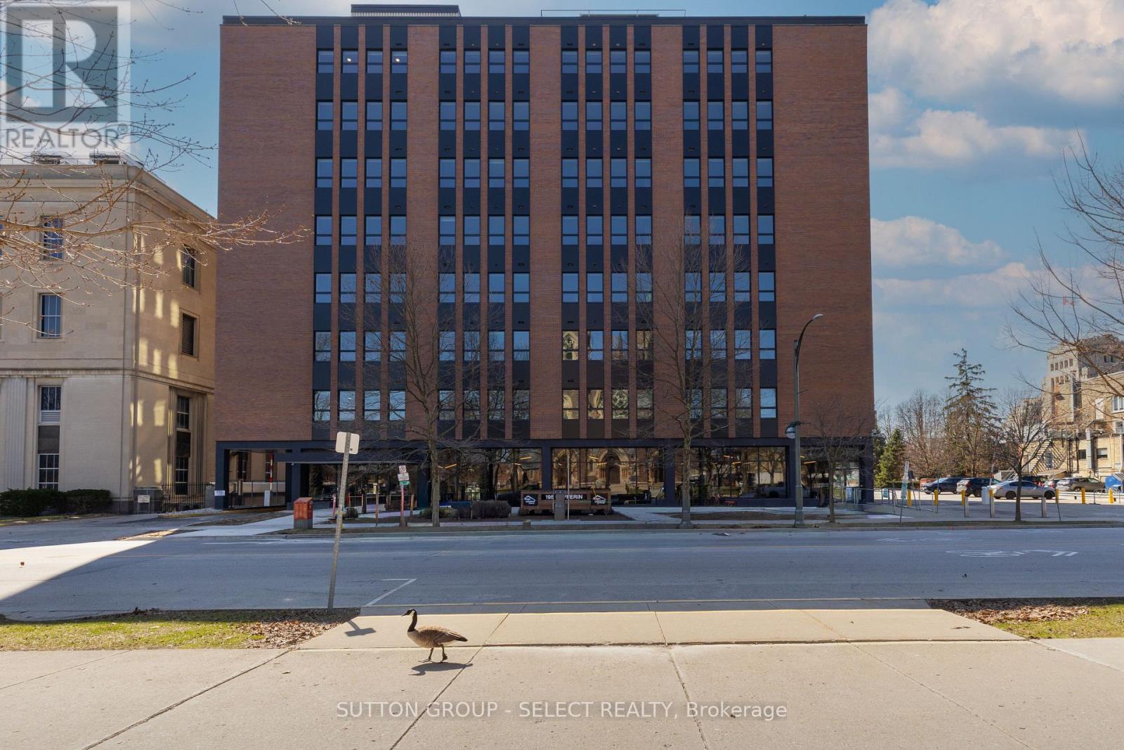 A building with a sign that says REALTOR in the upper left corner.