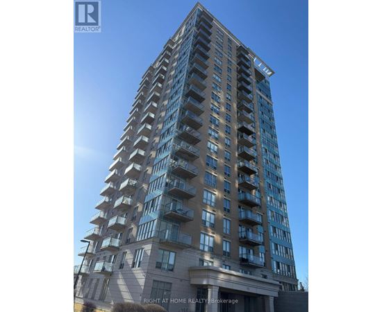 A tall building with balconies on the upper floors.