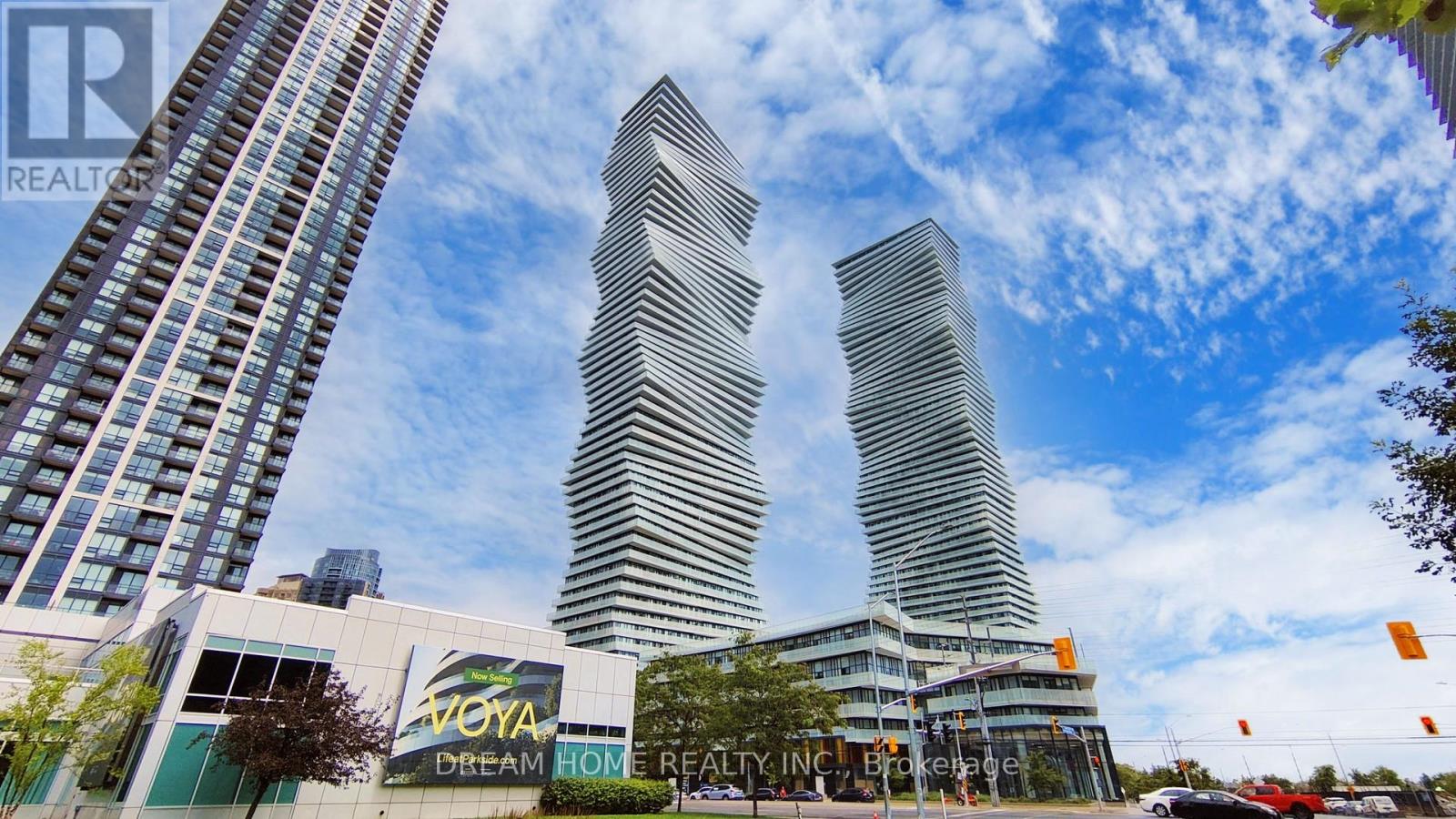 Two modern buildings with Voya signage in front of them.