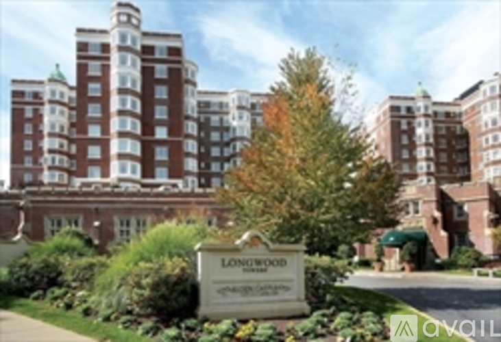 A sign that says Longwood in front of a building.