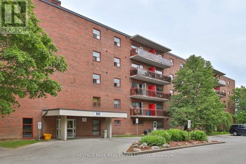 A red brick building with the number 600 on the front.