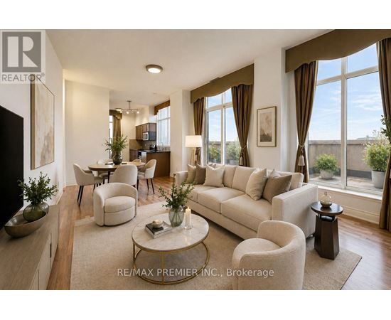 A well-lit living room with a large window and a view of the outdoors.