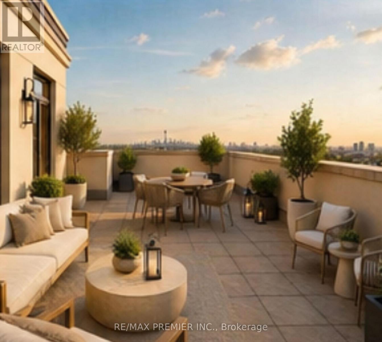 A patio with a table and chairs is set up on a balcony.