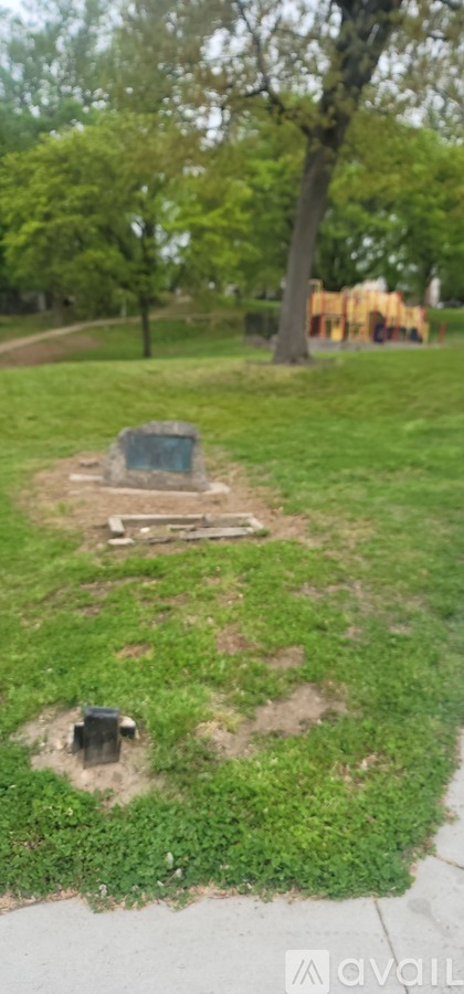A small grave in a grassy area.