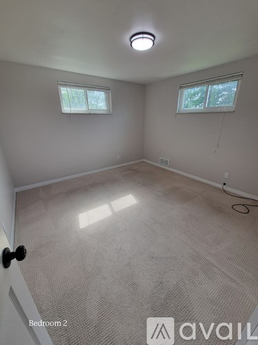 Bedroom 2 is empty and waiting to be furnished.
