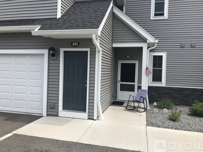 A house with the number 404 on the left and 403 on the right.