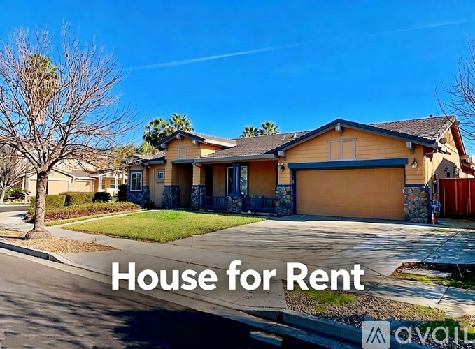 A house is for rent, as indicated by the sign in the image.