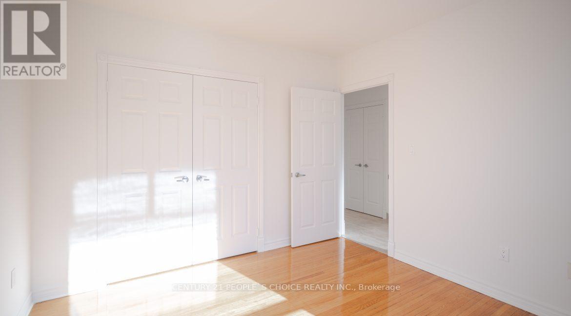 A realtor logo is on the top left corner of the image.