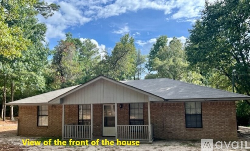 A house with a front porch is available for viewing.