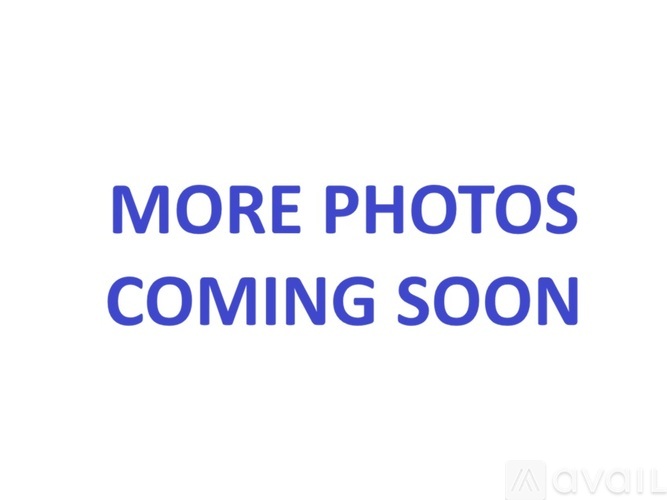 A blue text message that says "MORE PHOTOS COMING SOON".