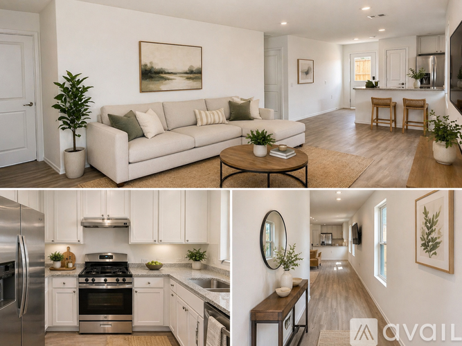 A modern kitchen and living room with white walls and wooden floors.