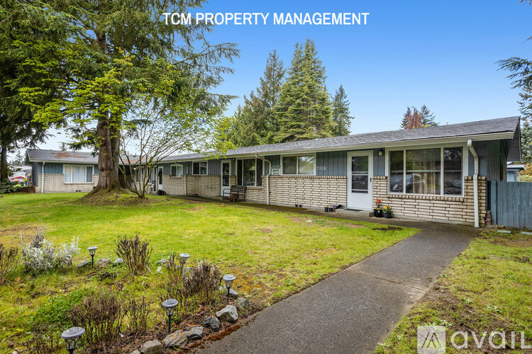 A house with the text "TCM PROPERTY MANAGEMENT" on the top left corner.