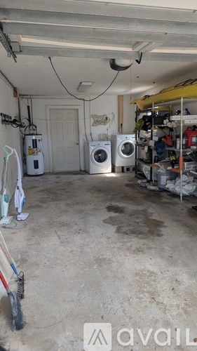 A laundry room with a washer and dryer.