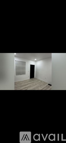 A room with a door and a window.