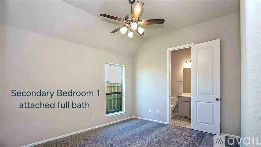A secondary bedroom with a full bath attached.