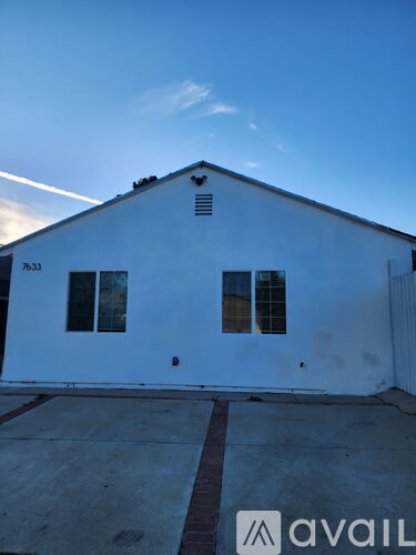 A white building with the number 733 on it.