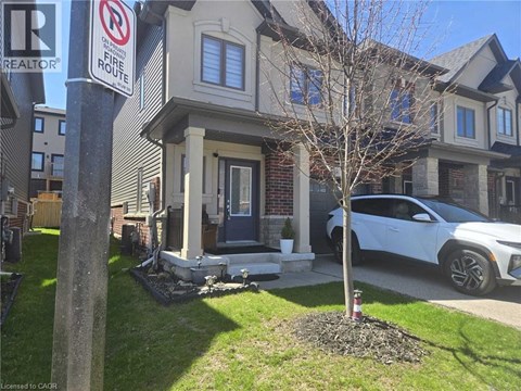 A house with a sign that says no fire hydrant.