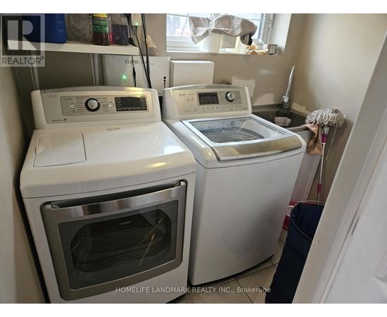 A white dishwasher and oven are in a kitchen.