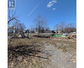 A sunny day at a construction site with a clear blue sky.