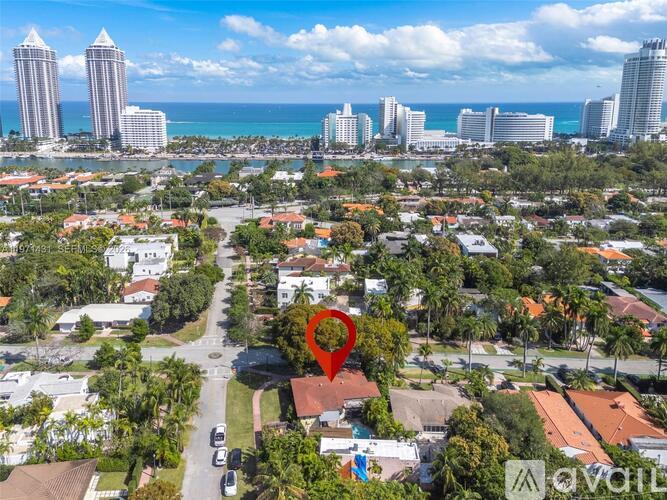 A red heart is drawn on a residential street.