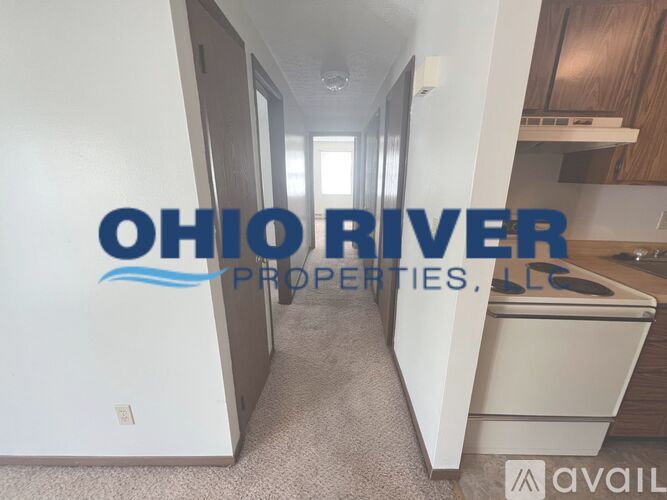 A hallway with a sign that says Ohio River Properties.