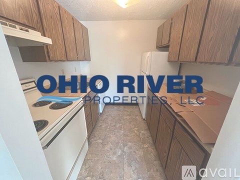 A kitchen with a sign that says Ohio River Properties, LLC.