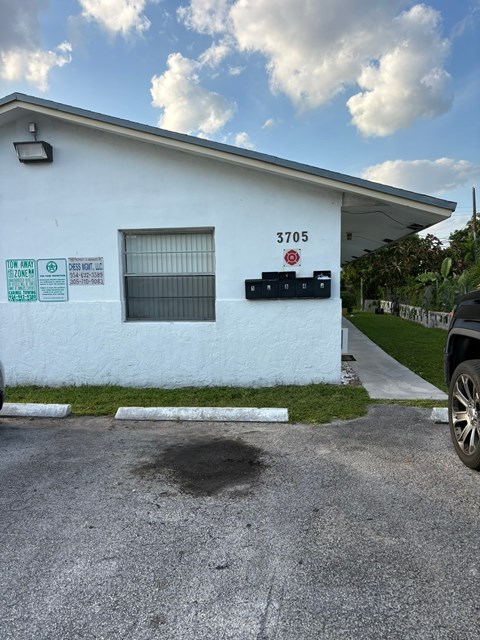 A white building with the number 3705 on it.
