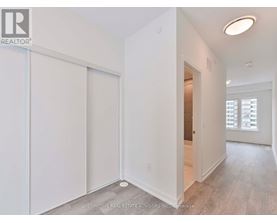 A white room with a sliding door and a window.