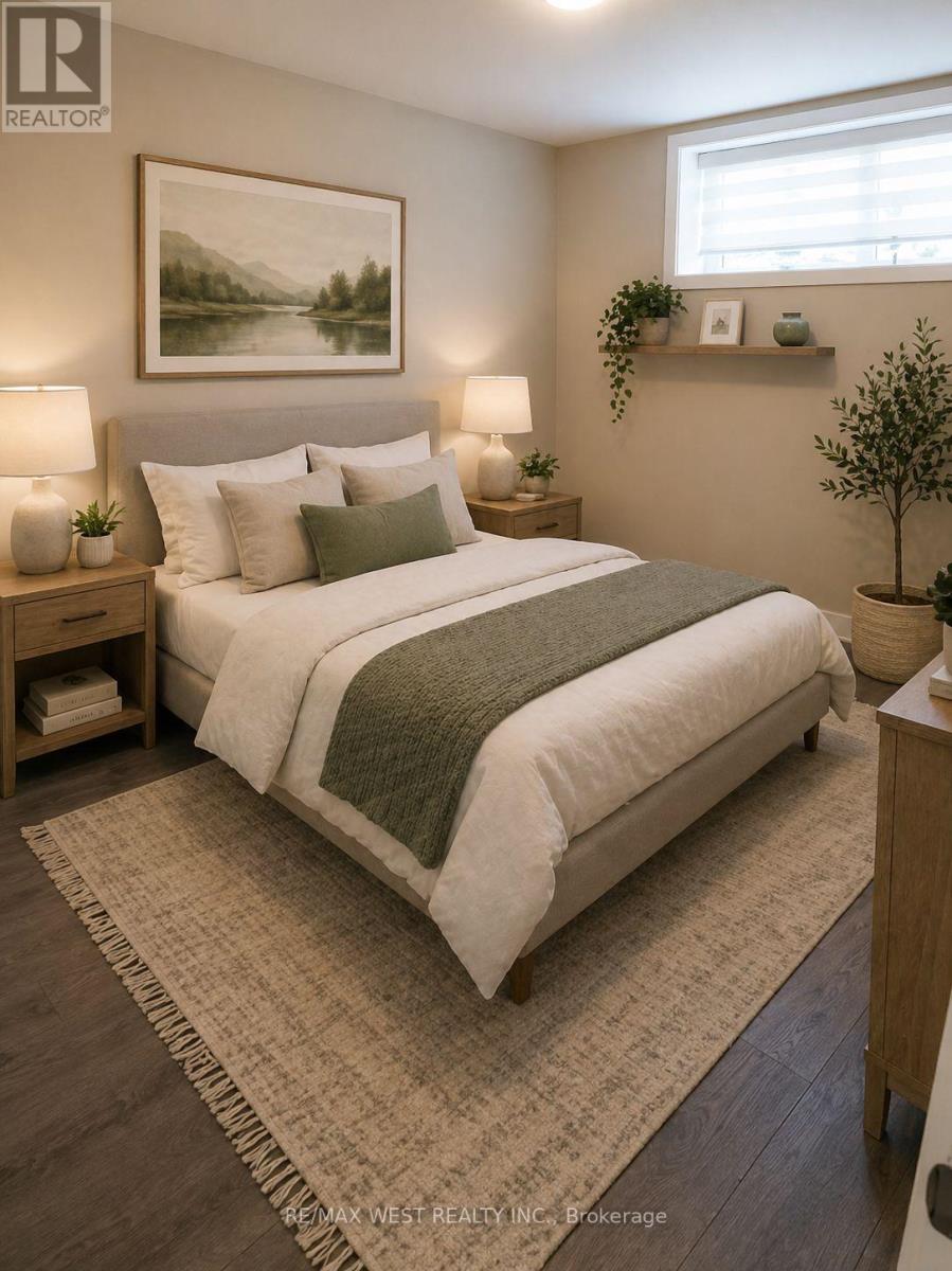 A bedroom with a large bed and a painting on the wall.