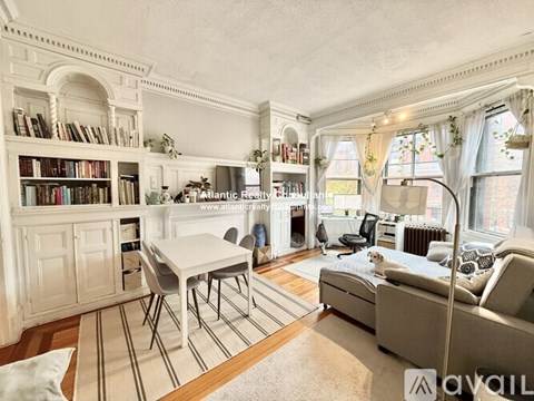 A well-lit, spacious living room with a variety of furniture and decorative elements.