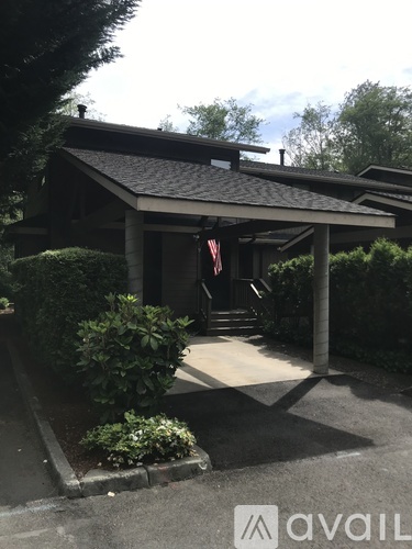 A house with a flag on the porch.