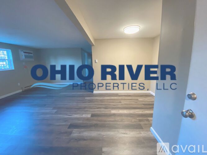 A hallway with the words Ohio River Properties, LLC on the wall.