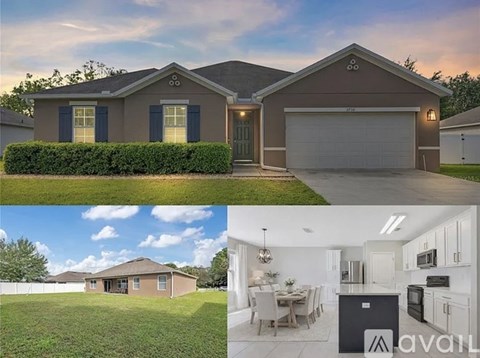 A house with a garage and a kitchen area is available for sale.
