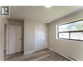 A room with two doors and a window.