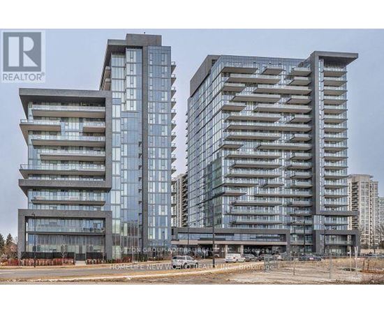 Two modern buildings with glass windows and balconies are under construction.
