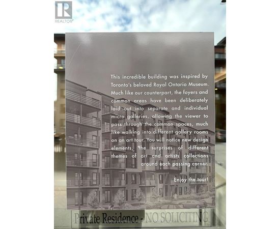 A sign for a private residence is displayed in front of a building.