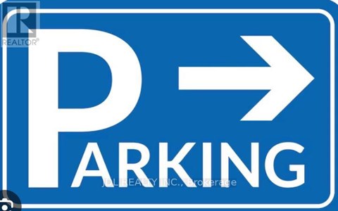 A blue and white parking sign with an arrow pointing to the right.