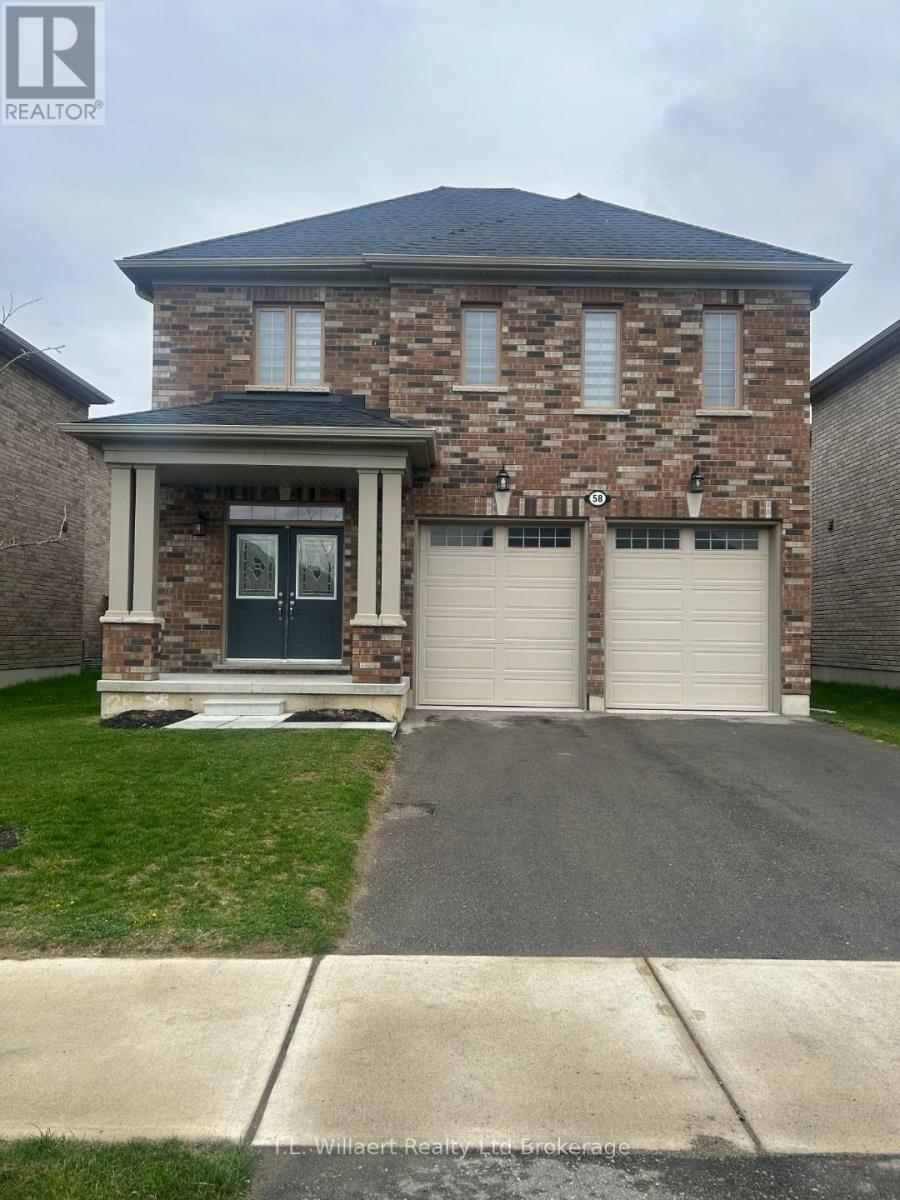 A house with a garage door and a driveway in front.