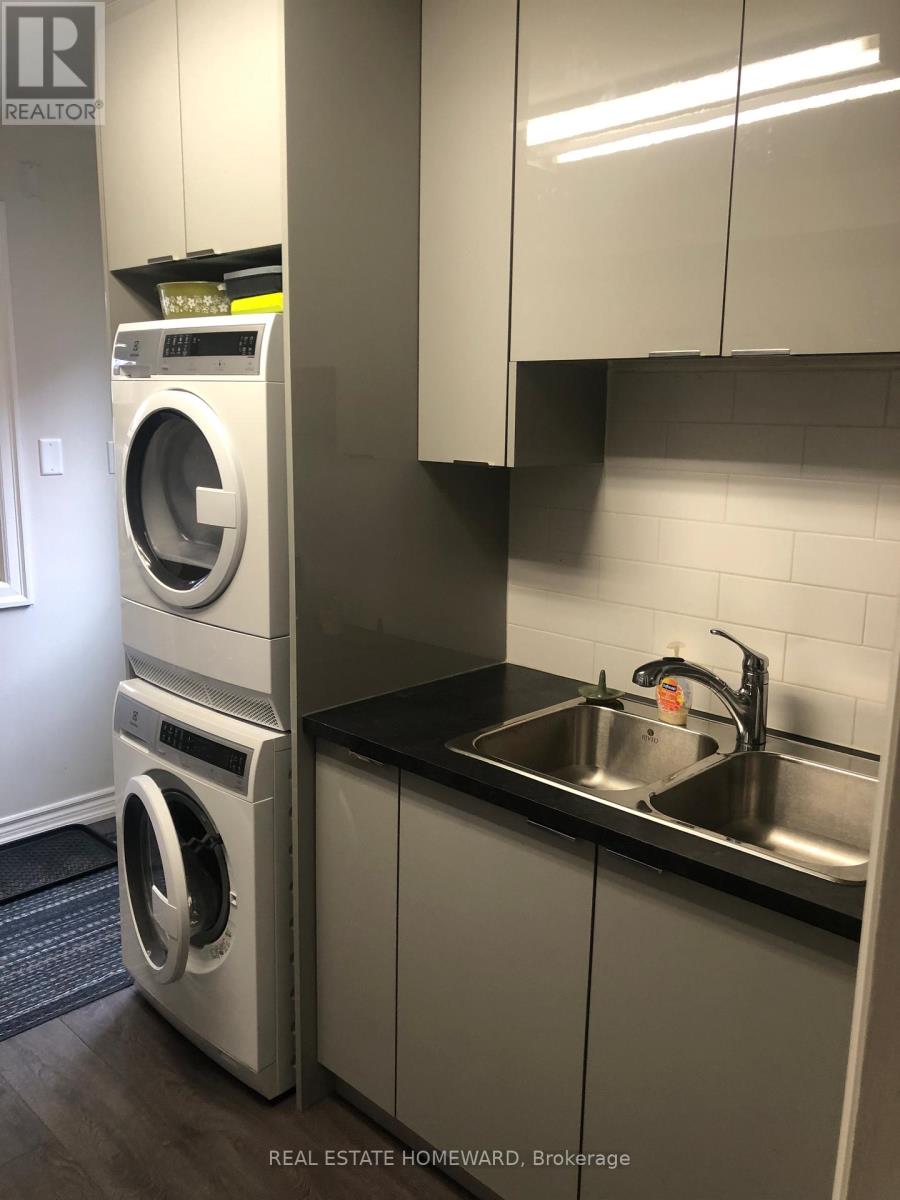 A washer and dryer in a small laundry room.