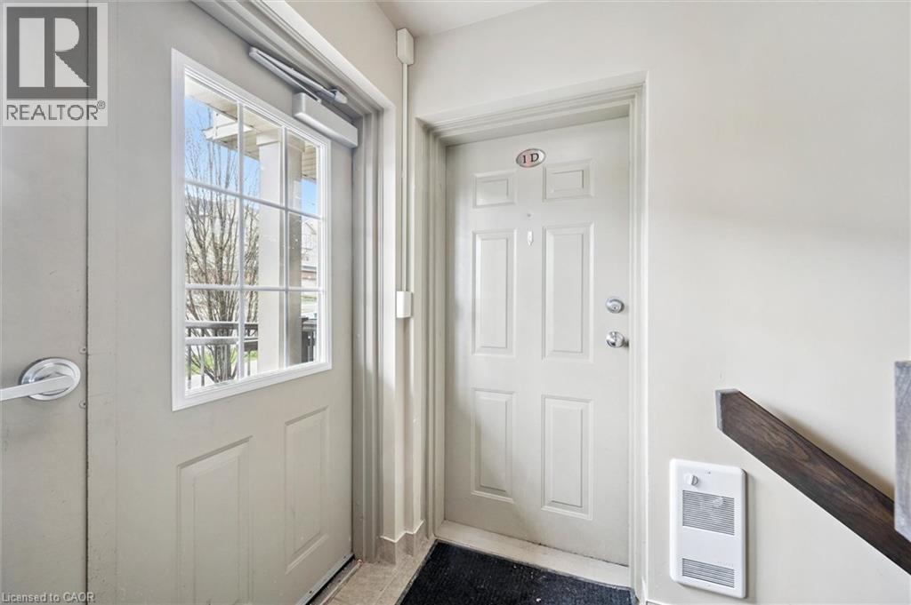 A white door with a small window above it.