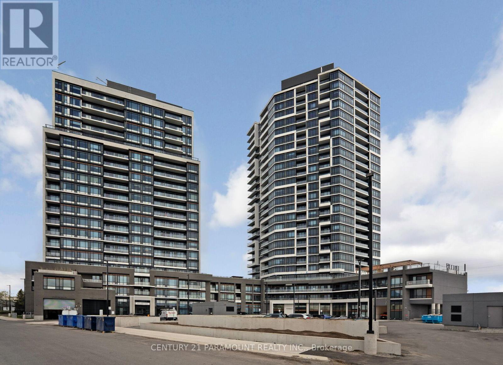 Two modern high-rise buildings are shown in the image.