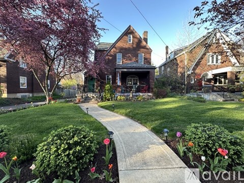 A residential area with a house and a garden.