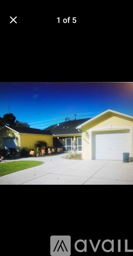 A house with a garage is shown in the image.