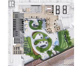 A bird's eye view of a property with a large courtyard and a swimming pool.