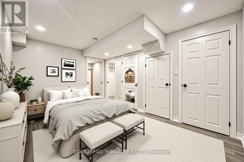 A bedroom with a bed, nightstand, and a plant.